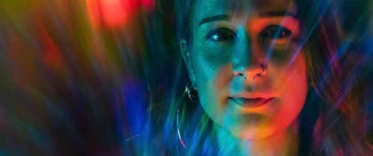 woman in colourful light
